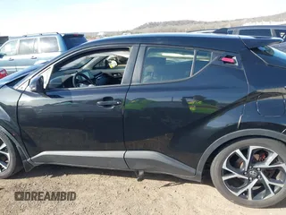 2018 Toyota C-HR XLE z VIN JTNKHMBX7J1004430, wystawiony jako IAAI lot #41780739 z przebiegiem 148 882 mil mil oraz . Historia ofert i sprzedaży dostępna na DreamBid. Obrazek 15.