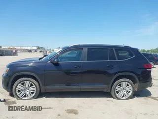2019 Volkswagen Atlas SE z VIN 1V2WR2CA4KC595211, wystawiony jako IAAI lot #41986643 z przebiegiem 96 299 mil mil oraz . Historia ofert i sprzedaży dostępna na DreamBid. Obrazek 14.