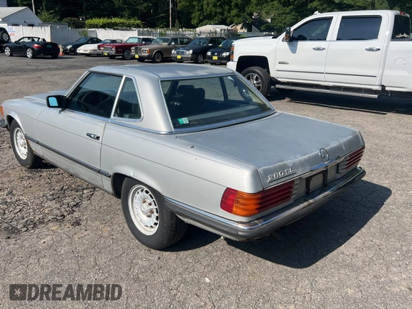 1984 Mercedes-Benz SL with VIN WDB1070421A009542, listed as a Copart auction lot 65327125 with 142,656 mi miles and Clean title. Bid and sale history available at DreamBid. Image 3.