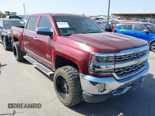 2014 Chevrolet Silverado 1500 LT with VIN 3GCPCRECXEG410417, listed as a IAAI auction lot 41854194 with 128,352 mi miles. Bid and sale history available at carsss.com. Image 1.