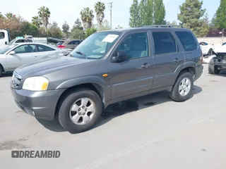 2003 Mazda Tribute LX with VIN 4F2YZ04193KM08890, listed as a IAAI auction lot 42158385 with 282,314 mi miles and . Bid and sale history available at carsss.com. Image 2.