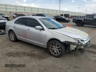 2012 Ford Fusion SEL with VIN 3FAHP0JG7CR257418, listed as a Copart auction lot 61842175 with 167,669 mi miles and Salvage title. Bid and sale history available at DreamBid. Image 4.