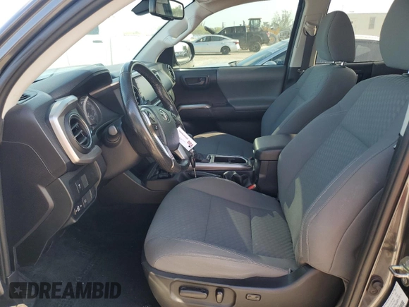 2020 Toyota Tacoma SR5 with VIN 3TMAZ5CN9LM125157, listed as a Copart auction lot 57178885 with 59,830 mi miles and Salvage title. Bid and sale history available at DreamBid. Image 7.