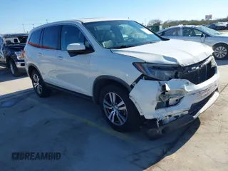 2017 Honda Pilot EX-L with VIN 5FNYF5H54HB043638, listed as a IAAI auction lot 41664471 with 103,025 mi miles. Bid and sale history available at carsss.com. Image 1.