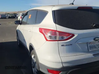 2013 Ford Escape SE z VIN 1FMCU9GX2DUB46936, wystawiony jako IAAI lot #42792269 z przebiegiem 196 885 mil mil oraz . Historia ofert i sprzedaży dostępna na DreamBid. Obrazek 15.