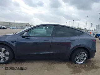 2024 Tesla Model Y Long Range with VIN 7SAYGDEE0RA261489, listed as a IAAI auction lot 41729325 with 5,060 mi miles. Bid and sale history available at carsss.com. Image 14.