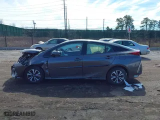 2018 Toyota Prius Prime Plus with VIN JTDKARFP3J3096141, listed as a IAAI auction lot 41822905 with 61,159 mi miles. Bid and sale history available at carsss.com. Image 13.