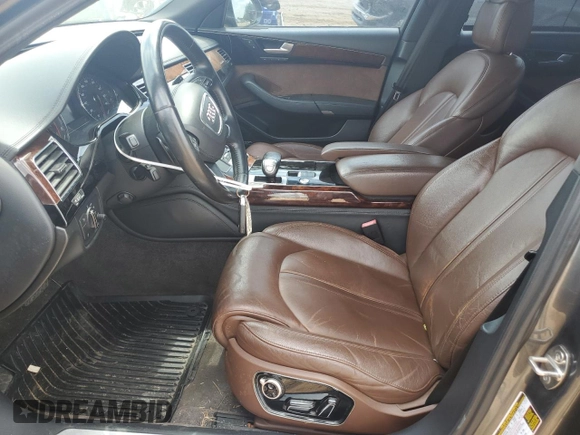 2011 Audi A8 z VIN WAURVAFD9BN013776, wystawiony jako Copart lot #51989675 z przebiegiem 148 822 mil mil oraz Szkody całkowita. Historia ofert i sprzedaży dostępna na DreamBid. Obrazek 7.