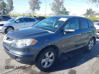 2007 Acura RDX Tech Pkg with VIN 5J8TB18557A012048, listed as a IAAI auction lot 41865836 with 170,611 mi miles. Bid and sale history available at carsss.com. Image 2.