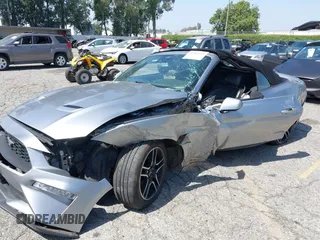 2021 Ford Mustang EcoBoost z VIN 1FATP8UH2M5120162, wystawiony jako IAAI lot #42561125 z przebiegiem 55 360 mil mil oraz . Historia ofert i sprzedaży dostępna na DreamBid. Obrazek 2.