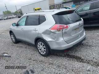 2016 Nissan Rogue SV with VIN JN8AT2MT0GW015301, listed as a IAAI auction lot 41930831 with 113,055 mi miles and . Bid and sale history available at carsss.com. Image 3.