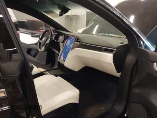 2016 Tesla Model X 70D with VIN 5YJXCBE23GF004941, listed as a IAAI auction lot 41706603 with 108,052 mi miles and . Bid and sale history available at DreamBid. Image 5.
