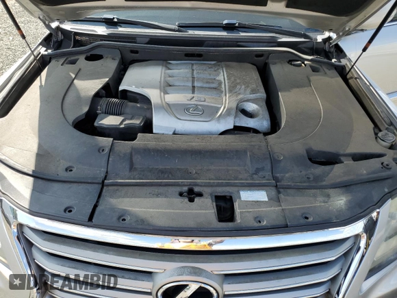 2013 Lexus LX 570 z VIN JTJHY7AX5D4086983, wystawiony jako Copart lot #68106944 z przebiegiem Nie podano mil oraz Szkoda całkowita • Salvage title. Historia ofert i sprzedaży dostępna na DreamBid. Obrazek 14.