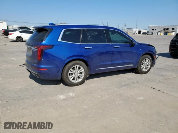 2023 Cadillac XT6 FWD Luxury z VIN 1GYKPAR42PZ167668, wystawiony jako Copart lot #53278075 z przebiegiem 32 212 mil mil oraz Szkoda całkowita • Salvage title. Historia ofert i sprzedaży dostępna na DreamBid. Obrazek 3.