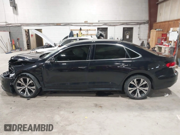 2021 Volkswagen Passat SE z VIN 1VWSA7A39MC001401, wystawiony jako IAAI lot #42019308 z przebiegiem 82 203 mil mil oraz . Historia ofert i sprzedaży dostępna na DreamBid. Obrazek 14.