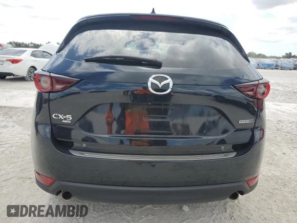 2021 Mazda CX-5 Touring z VIN JM3KFBCM8M1436782, wystawiony jako Copart lot #54144645 z przebiegiem 52 388 mil mil oraz Szkoda całkowita • Salvage title. Historia ofert i sprzedaży dostępna na DreamBid. Obrazek 6.