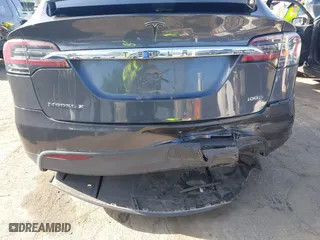 2018 Tesla Model X 75D with VIN 5YJXCBE22JF124270, listed as a IAAI auction lot 41909734 with 92,553 mi miles. Bid and sale history available at carsss.com. Image 6.