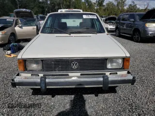 1983 Volkswagen Rabbit z VIN 1V1KG0170DV038002, wystawiony jako Copart lot #79815264 z przebiegiem 147 480 mil mil oraz Szkody całkowita. Historia ofert i sprzedaży dostępna na DreamBid. Obrazek 5.
