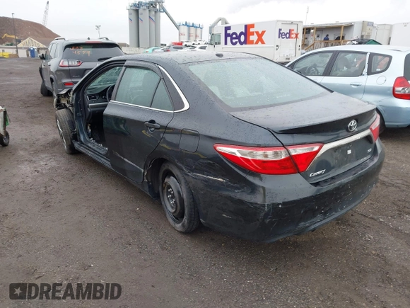 2015 Toyota Camry XLE with VIN 4T1BF1FK1FU087653, listed as a IAAI auction lot 41942940 with 180,274 mi miles. Bid and sale history available at carsss.com. Image 3.