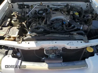 2004 Nissan Frontier XE z VIN 1N6ED27T44C450726, wystawiony jako Copart lot #57004045 z przebiegiem 151 638 mil mil oraz Szkoda całkowita • Salvage title. Historia ofert i sprzedaży dostępna na DreamBid. Obrazek 11.