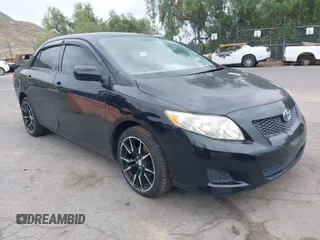 2010 Toyota Corolla with VIN 1NXBU4EE9AZ268818, listed as a IAAI auction lot 42058417 with 115,124 mi miles. Bid and sale history available at carsss.com. Image 1.