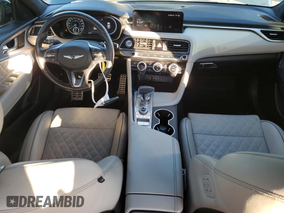 2023 Genesis G70 3.3T with VIN KMTG54TE1PU106881, listed as a Copart auction lot 83988384 with 70,698 mi miles and Salvage Title. Bid and sale history available at DreamBid. Image 8.