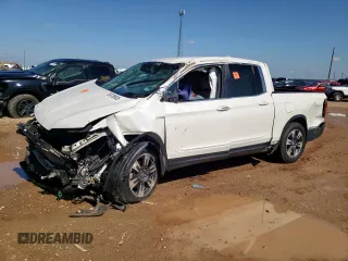 2017 Honda Ridgeline RTL z VIN 5FPYK2F52HB008083, wystawiony jako Copart lot #58738935 z przebiegiem Nie podano mil oraz Szkoda całkowita • Salvage title. Historia ofert i sprzedaży dostępna na DreamBid. Obrazek 1.
