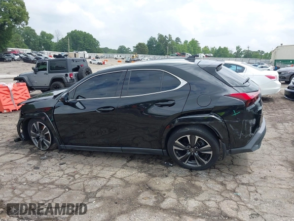 2022 Lexus UX 200 with VIN JTHP3JBHXN2046587, listed as a IAAI auction lot 42378996 with 32,000 mi miles and . Bid and sale history available at DreamBid. Image 14.