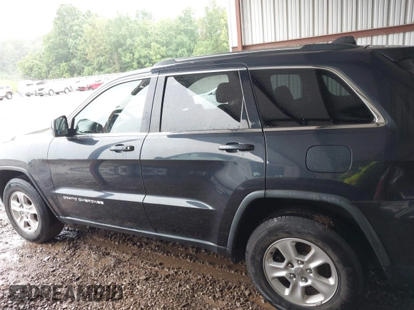 2014 Jeep Grand Cherokee Laredo with VIN 1C4RJEAG6EC206748, listed as a IAAI auction lot 42244421 with 198,217 mi miles and . Bid and sale history available at DreamBid. Image 14.