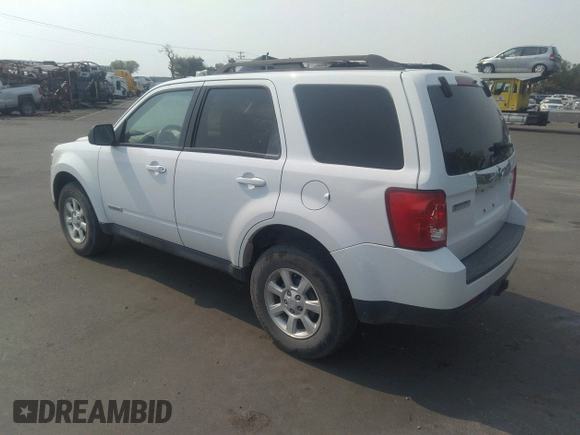 2008 Mazda Tribute Touring with VIN 4F2CZ96138KM32735, listed as a IAAI auction lot 31145122 with 206,608 mi miles and . Bid and sale history available at DreamBid. Image 3.