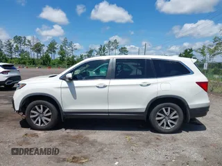 2019 Honda Pilot EX-L with VIN 5FNYF5H42KB026108, listed as a IAAI auction lot 42387593 with 112,556 mi miles and . Bid and sale history available at DreamBid. Image 14.