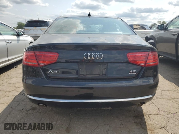 2011 Audi A8 z VIN WAURVAFD9BN005595, wystawiony jako Copart lot #66302644 z przebiegiem 106 610 mil mil oraz Nie do naprawy. Historia ofert i sprzedaży dostępna na DreamBid. Obrazek 6.