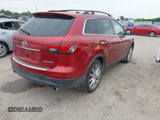 2015 Mazda CX-9 Grand Touring with VIN JM3TB2DA6F0460785, listed as a IAAI auction lot 42474705 with 62,202 mi miles and . Bid and sale history available at DreamBid. Image 4.