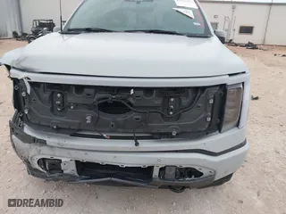 2023 Ford F-150 Lightning Pro with VIN 1FTVW1EL7PWG19070, listed as a IAAI auction lot 41536193 with 22,654 mi miles. Bid and sale history available at carsss.com. Image 21.