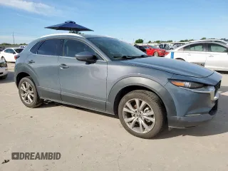 2020 Mazda CX-30 Premium with VIN 3MVDMAEMXLM125319, listed as a Copart auction lot 57896985 with 117,692 mi miles and Salvage title. Bid and sale history available at DreamBid. Image 4.