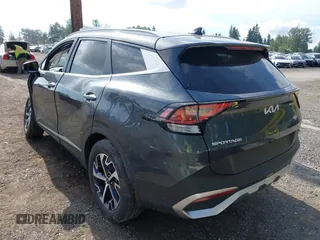 2023 Kia Sportage EX with VIN KNDPVCAGXP7091731, listed as a IAAI auction lot 42551355 with 29,448 mi miles and . Bid and sale history available at DreamBid. Image 3.