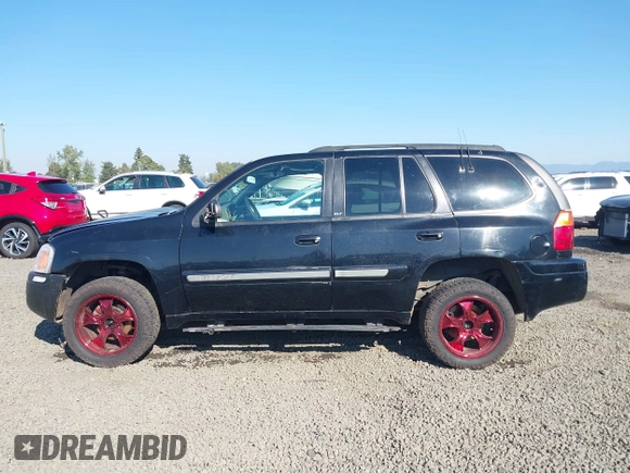 2002 GMC Envoy SLT z VIN 1GKDT13S522146661, wystawiony jako IAAI lot #40502587 z przebiegiem 274 877 mil mil oraz . Historia ofert i sprzedaży dostępna na DreamBid. Obrazek 15.