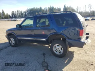 2000 Chevrolet Blazer LT z VIN 1GNDT13W8Y2119632, wystawiony jako Copart lot #47387175 z przebiegiem 140 356 mil mil oraz Szkoda całkowita • Salvage title. Historia ofert i sprzedaży dostępna na DreamBid. Obrazek 2.
