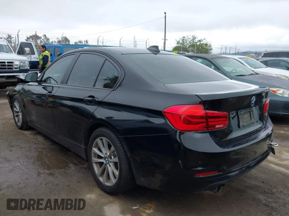 2016 BMW 3 Series 320i with VIN WBA8A9C51GK617012, listed as a IAAI auction lot 41896624 with 56,289 mi miles. Bid and sale history available at carsss.com. Image 3.