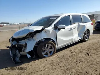 2018 Honda Odyssey EX-L z VIN 5FNRL6H74JB036571, wystawiony jako Copart lot #53156885 z przebiegiem 135 399 mil mil oraz Szkoda całkowita • Salvage title. Historia ofert i sprzedaży dostępna na DreamBid. Obrazek 1.