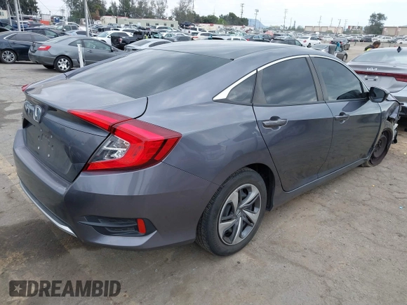 2020 Honda Civic LX with VIN 2HGFC2F64LH576765, listed as a IAAI auction lot 41881444 with 32,129 mi miles and . Bid and sale history available at DreamBid. Image 4.