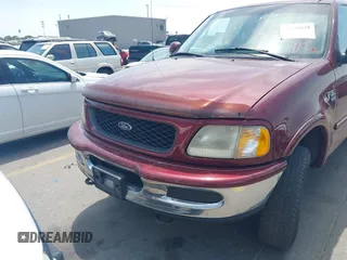 1998 Ford F-150 with VIN 1FTZX18W9WKC09638, listed as a IAAI auction lot 42576838 with 140,714 mi miles and . Bid and sale history available at DreamBid. Image 6.