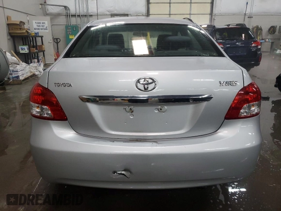 2007 Toyota Yaris with VIN JTDBT923571109568, listed as a Copart auction lot 45751305 with 124,836 mi miles and Salvage Title. Bid and sale history available at DreamBid. Image 6.