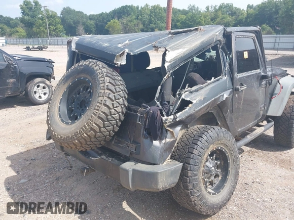 2014 Jeep Wrangler Sport with VIN 1C4AJWAGXEL233647, listed as a IAAI auction lot 39993785 with Not Provided miles and . Bid and sale history available at DreamBid. Image 20.