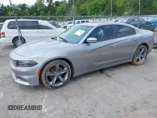 2015 Dodge Charger SXT with VIN 2C3CDXHG2FH768681, listed as a IAAI auction lot 39939245 with Not Provided miles and . Bid and sale history available at DreamBid. Image 2.