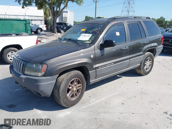 2004 Jeep Grand Cherokee Laredo with VIN 1J4GW48S74C401022, listed as a IAAI auction lot 41982319 with 170,607 mi miles. Bid and sale history available at carsss.com. Image 2.