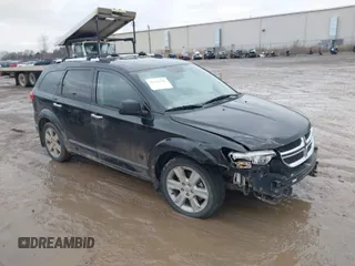 2013 Dodge Journey R/T with VIN 3C4PDDFG7DT724534, listed as a IAAI auction lot 41161346 with 175,606 mi miles and . Bid and sale history available at DreamBid. Image 1.