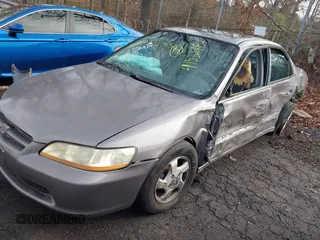 2000 Honda Accord EX z VIN 1HGCG5651YA129056, wystawiony jako IAAI lot #41532787 z przebiegiem Nie podano mil oraz . Historia ofert i sprzedaży dostępna na DreamBid. Obrazek 20.