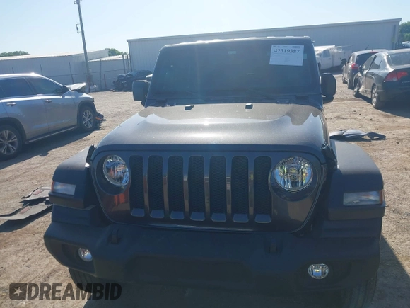 2021 Jeep Wrangler Unlimited Sport S with VIN 1C4HJXDG3MW801301, listed as a IAAI auction lot 42319387 with Not provided miles and . Bid and sale history available at DreamBid. Image 12.