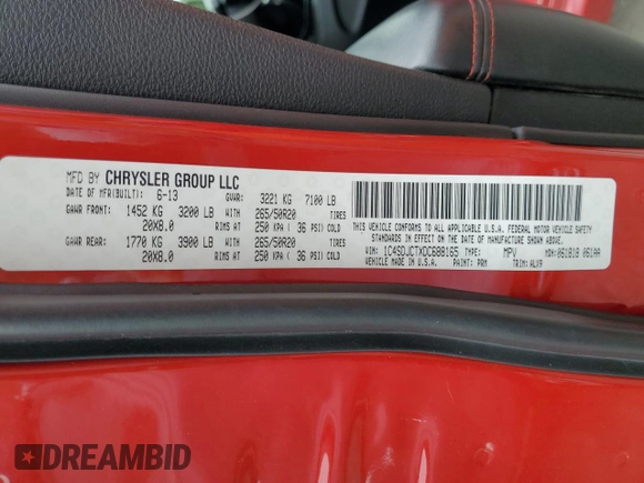 2013 Dodge Durango R/T with VIN 1C4SDJCTXDC688165, listed as a Copart auction lot 61071195 with 139,075 mi miles and Salvage title. Bid and sale history available at DreamBid. Image 14.